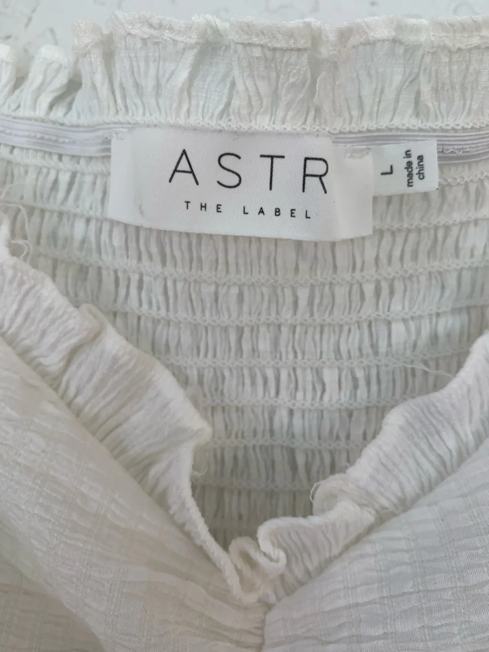 ASTR cream Textured Puff Sleeve Peplum Blouse size L